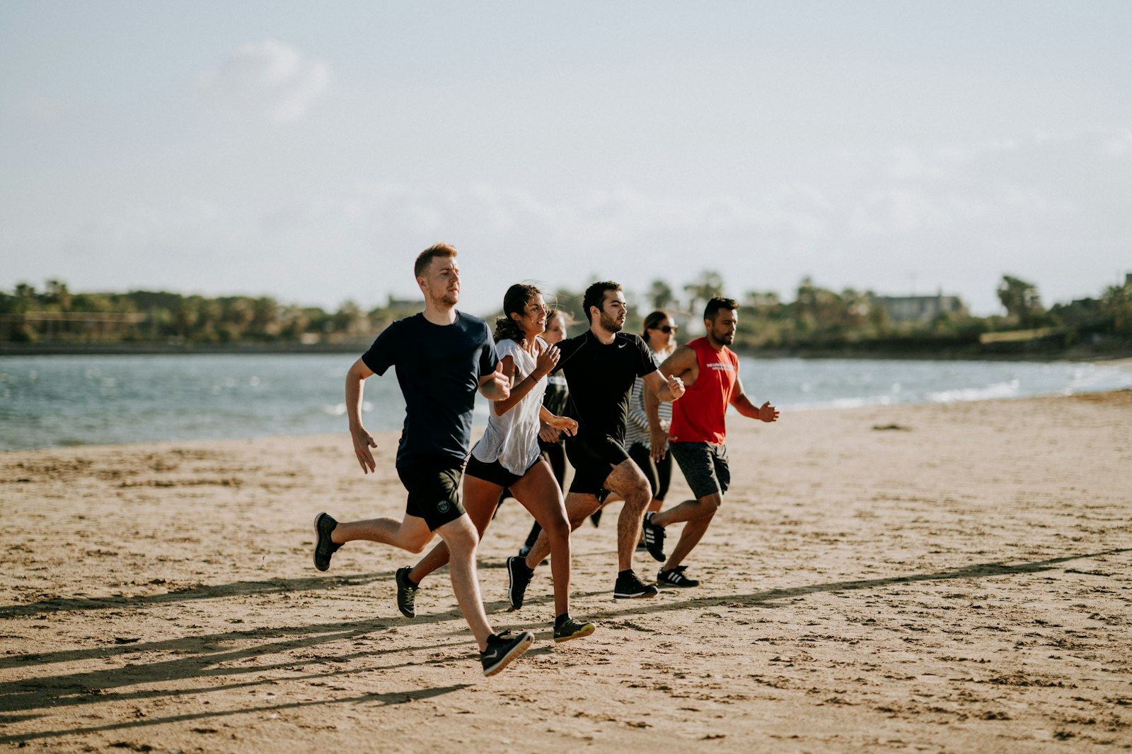 A relaxed group of runners out together in the morning sun
